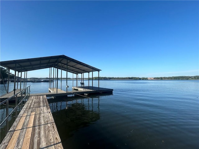 view of dock with a water view