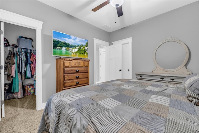 bedroom with ceiling fan, a spacious closet, a closet, and visible vents