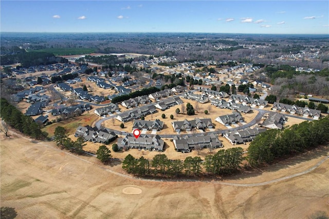 birds eye view of property with a residential view