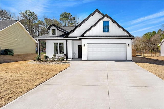 modern farmhouse featuring driveway