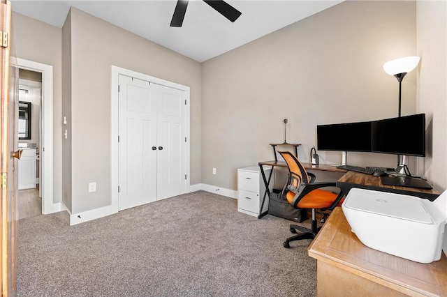 home office with lofted ceiling, carpet, baseboards, and a ceiling fan