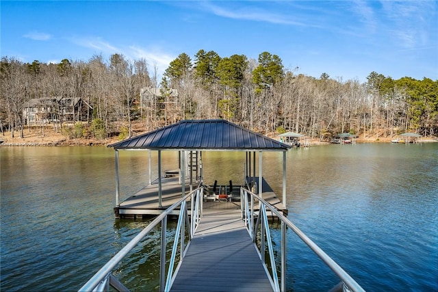 view of dock featuring a water view and boat lift