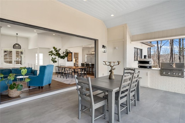 dining room with wooden ceiling, vaulted ceiling, and recessed lighting