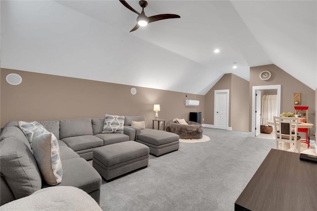 living room with baseboards, a ceiling fan, vaulted ceiling, and carpet flooring