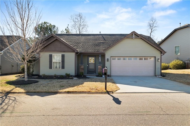 view of front facade with concrete driveway, a shingled roof, and an attached garage