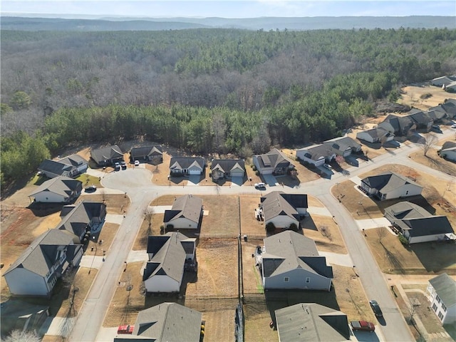 aerial view featuring a forest view