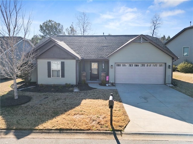 ranch-style house featuring a garage, a shingled roof, and concrete driveway