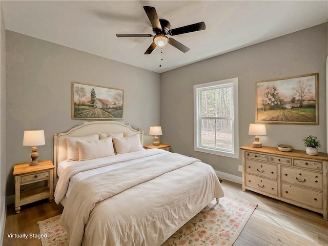 224 Simpson St, Westminster, SC 29693 - bedroom featuring light wood-type flooring and ceiling fan
