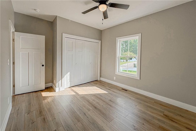 224 Simpson St, Westminster, SC 29693 - unfurnished bedroom with wood finished floors, a closet, and ceiling fan