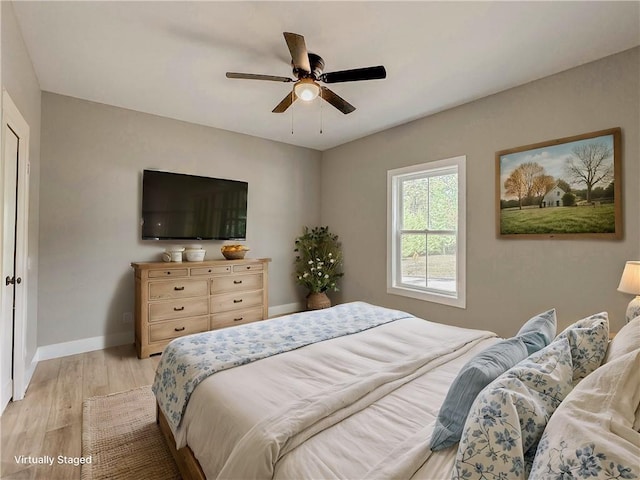 224 Simpson St, Westminster, SC 29693 - bedroom with light wood-style flooring and a ceiling fan