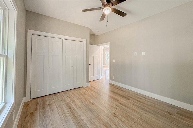 224 Simpson St, Westminster, SC 29693 - unfurnished bedroom with light wood-style flooring, a closet, and ceiling fan