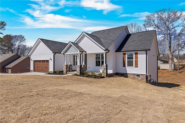 view of front of house with a garage, crawl space, and a shingled roof