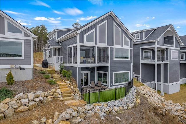 1230 Melton Rd Unit 215, West Union, SC 29696 - back of property featuring fence, stairway, and board and batten siding