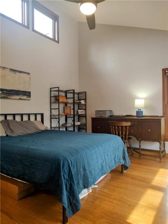 bedroom with wood finished floors