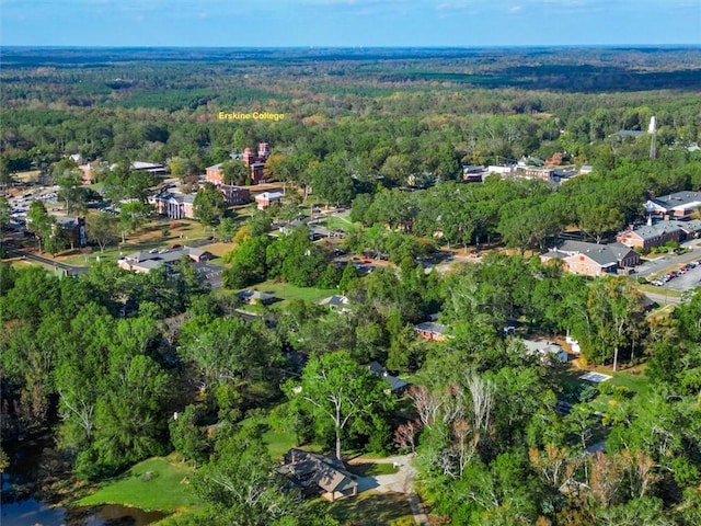 bird's eye view featuring a forest view