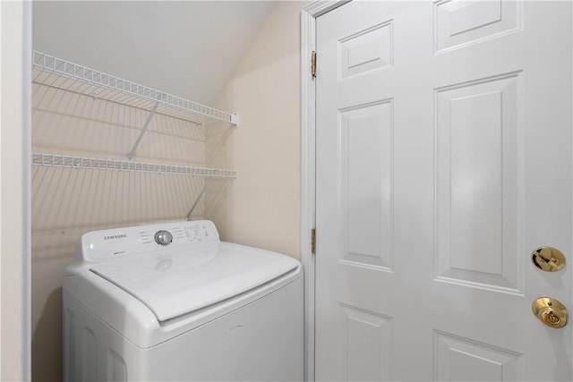 laundry room with washer / dryer and laundry area