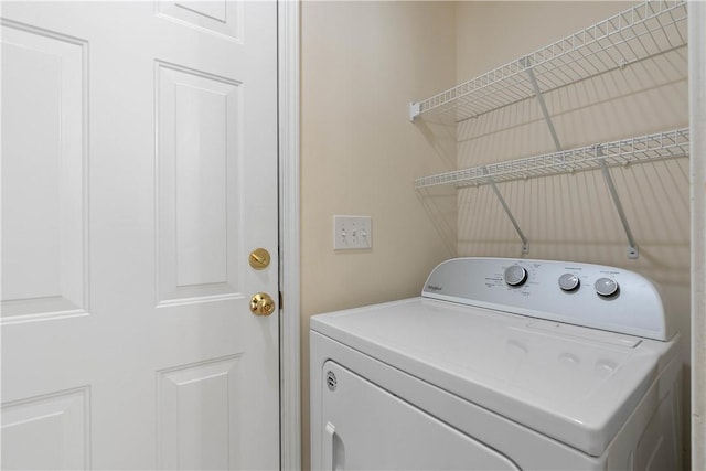 laundry area with washer / dryer and laundry area