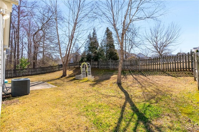 view of yard featuring cooling unit and a fenced backyard