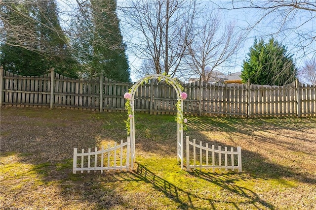 view of yard featuring fence