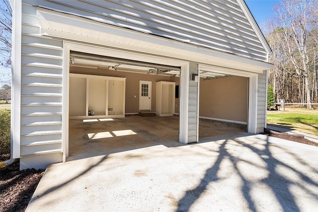 garage featuring driveway