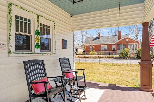 view of patio featuring fence