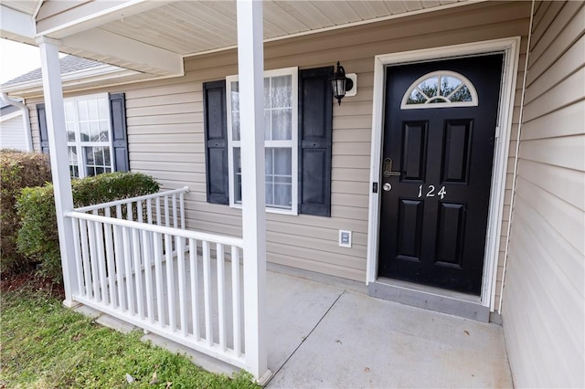 entrance to property with covered porch