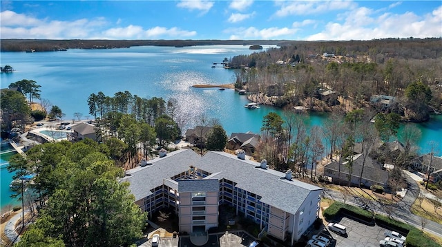 birds eye view of property featuring a water view