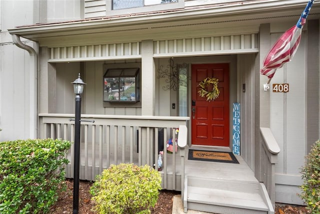 property entrance with a porch