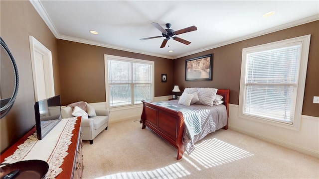 bedroom with recessed lighting, ornamental molding, light carpet, ceiling fan, and baseboards