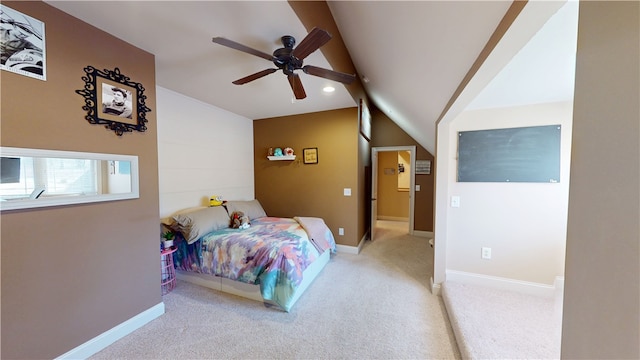 bedroom with lofted ceiling, ceiling fan, carpet flooring, and baseboards