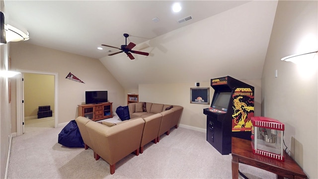 carpeted living area featuring lofted ceiling, recessed lighting, a ceiling fan, baseboards, and visible vents