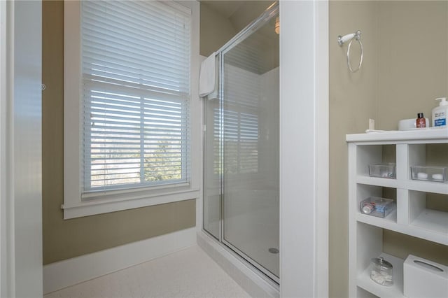 full bathroom featuring a shower stall