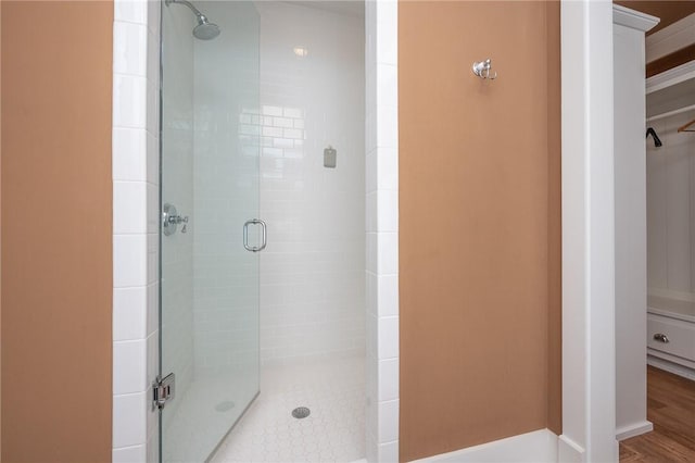 full bathroom featuring a stall shower