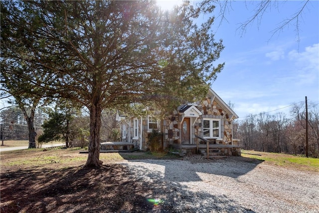 view of front of home with stone siding