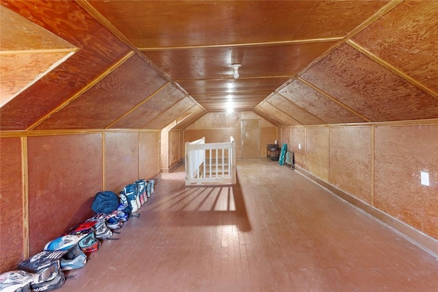 additional living space featuring wooden ceiling, vaulted ceiling, and hardwood / wood-style flooring