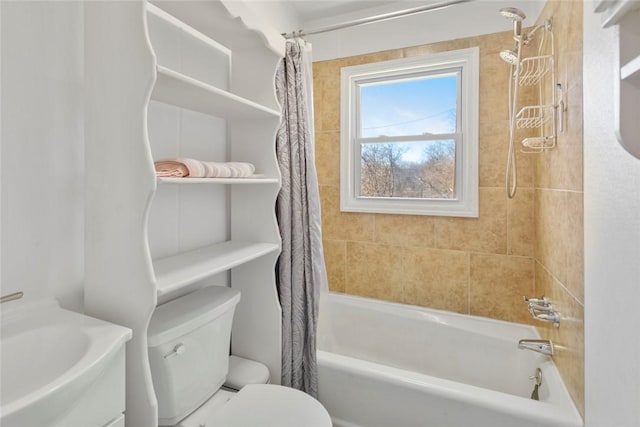 bathroom featuring toilet and shower / tub combo