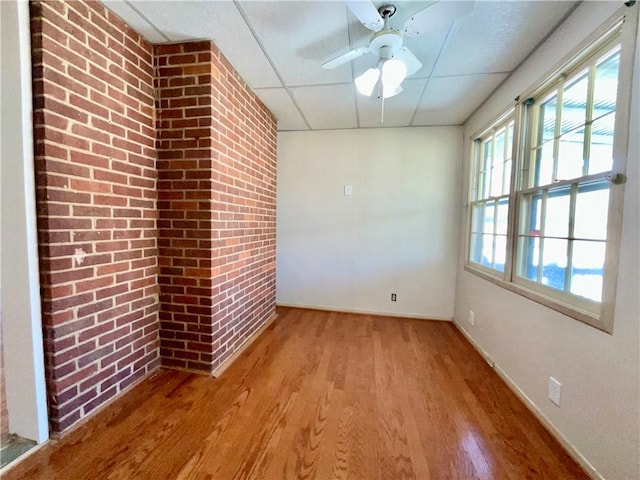 1003 S Walnut St, Seneca, SC 29678 - unfurnished room with light wood-style floors, baseboards, and a ceiling fan