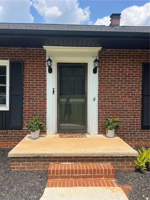 1003 S Walnut St, Seneca, SC 29678 - property entrance featuring brick siding and a chimney