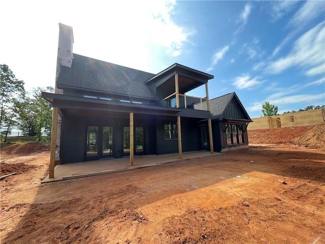 248 W Old Pendleton Rd, Central, SC 29630 - rear view of house with a balcony, a patio area, and a chimney