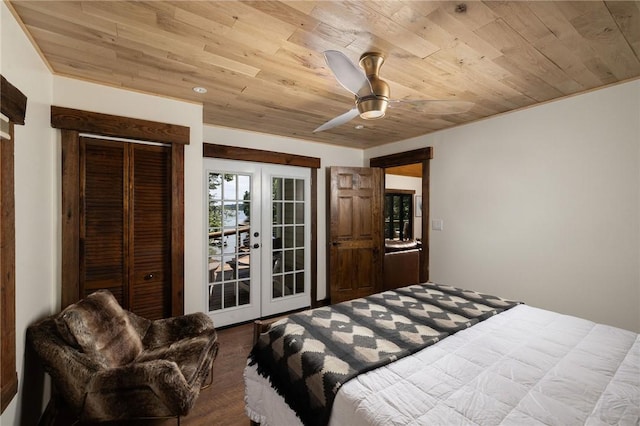 bedroom with a closet, wood ceiling, french doors, and a ceiling fan