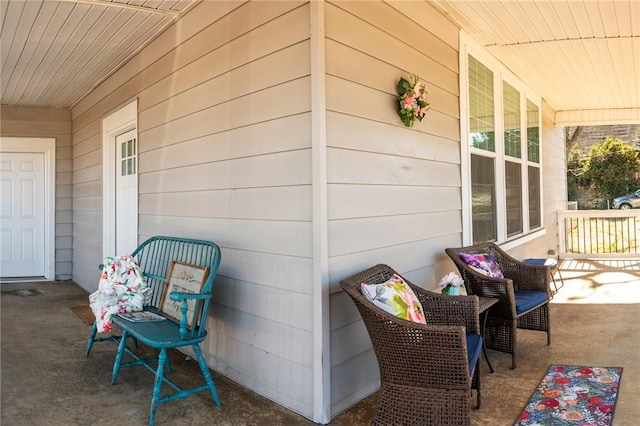 view of patio featuring a porch