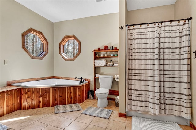 bathroom with toilet, a garden tub, tile patterned flooring, and curtained shower