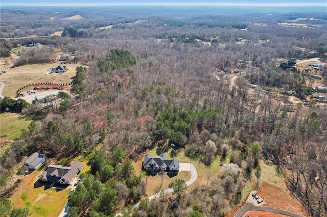 aerial view with a wooded view