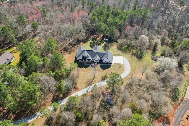 bird's eye view with a forest view