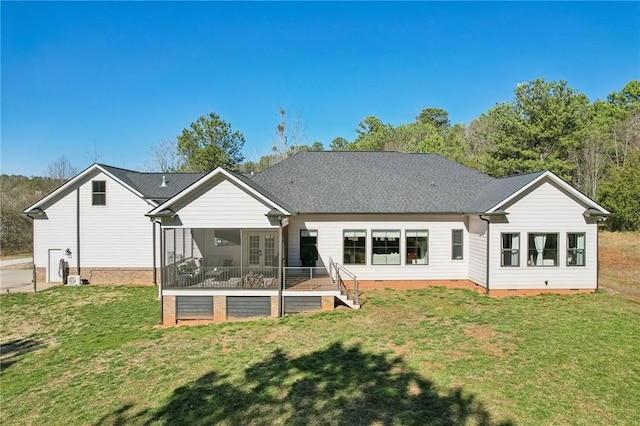 back of property featuring a yard and crawl space