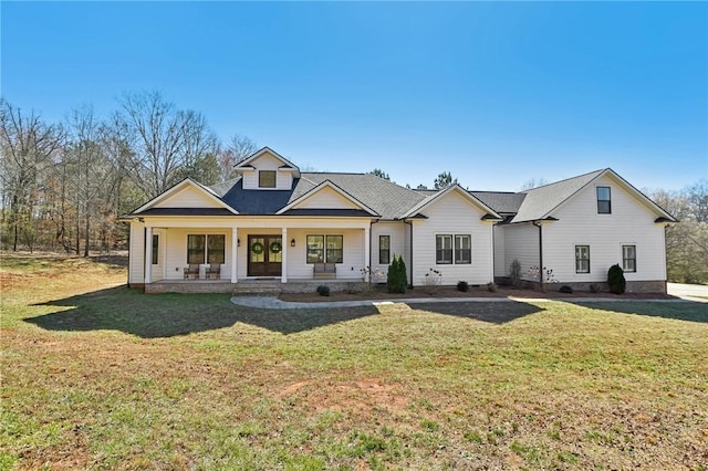 view of front of property featuring a front lawn and a porch