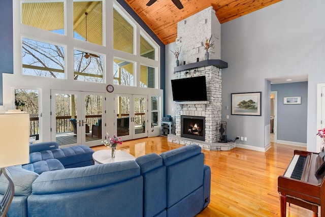 432 Over Look Dr, Fair Play, SC 29643 - living room featuring wood finished floors, a healthy amount of sunlight, ceiling fan, high vaulted ceiling, and wood ceiling