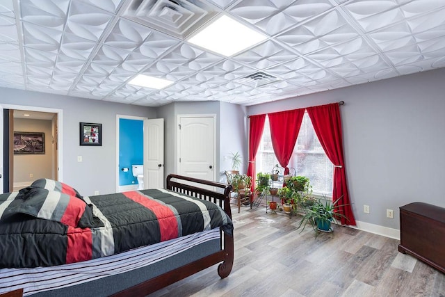 432 Over Look Dr, Fair Play, SC 29643 - bedroom featuring baseboards, wood finished floors, and visible vents