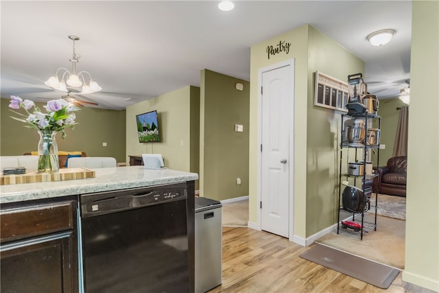 kitchen with dark brown cabinetry, baseboards, light wood-type flooring, dishwasher, and decorative light fixtures