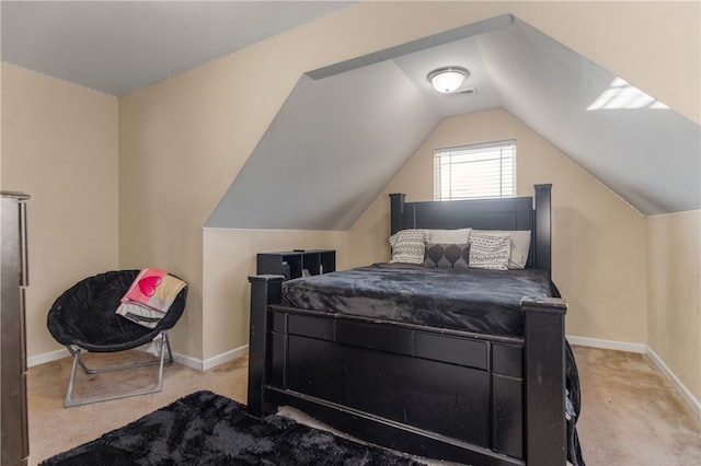 carpeted bedroom featuring lofted ceiling, visible vents, and baseboards